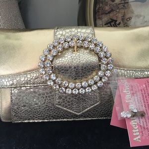 Charm and Luck Orbit Clutch in Gold Brand New